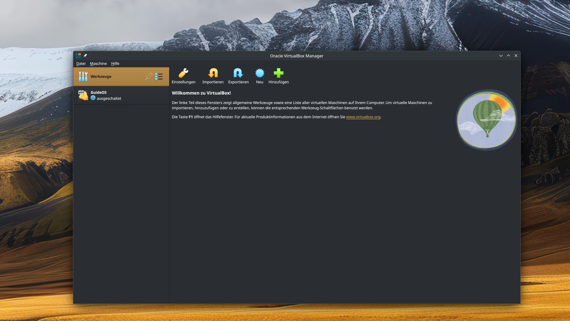 VirtualBox Manager Benutzeroberfläche vor Berglandschaft